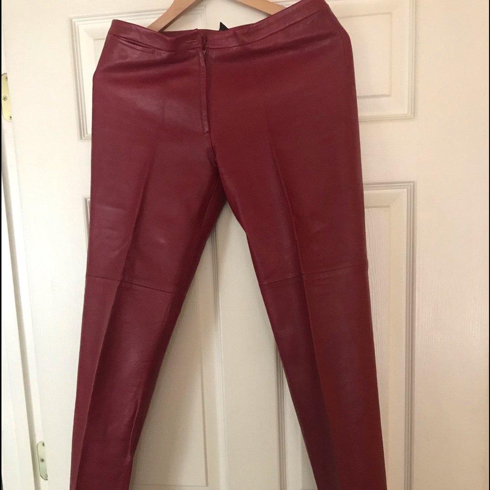 BCBG burgundy/red leather pants.